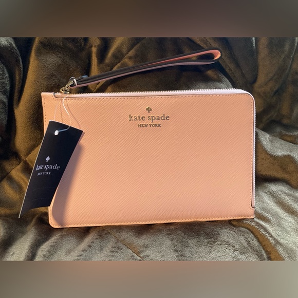 kate spade Handbags - Pretty light pink, Kate Spade, new with tags, saffiano leather, wristlet
